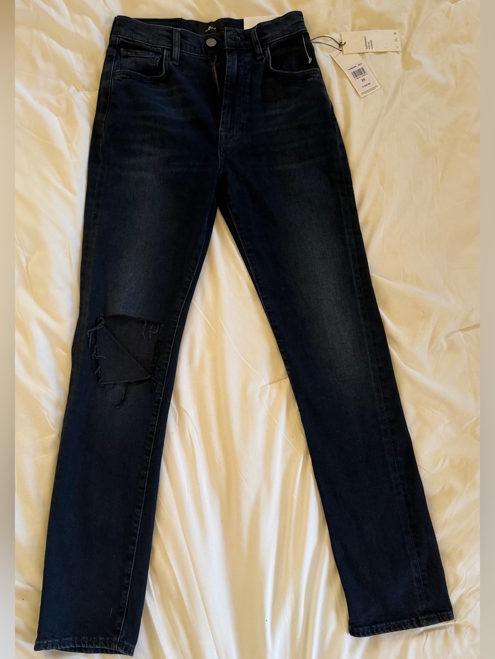 7 For All Mankind 
Dark Wash Skinny Jeans with Knee Patch